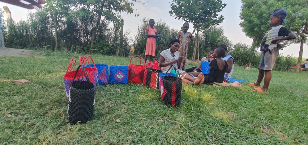 Participants presenting handmade baskets