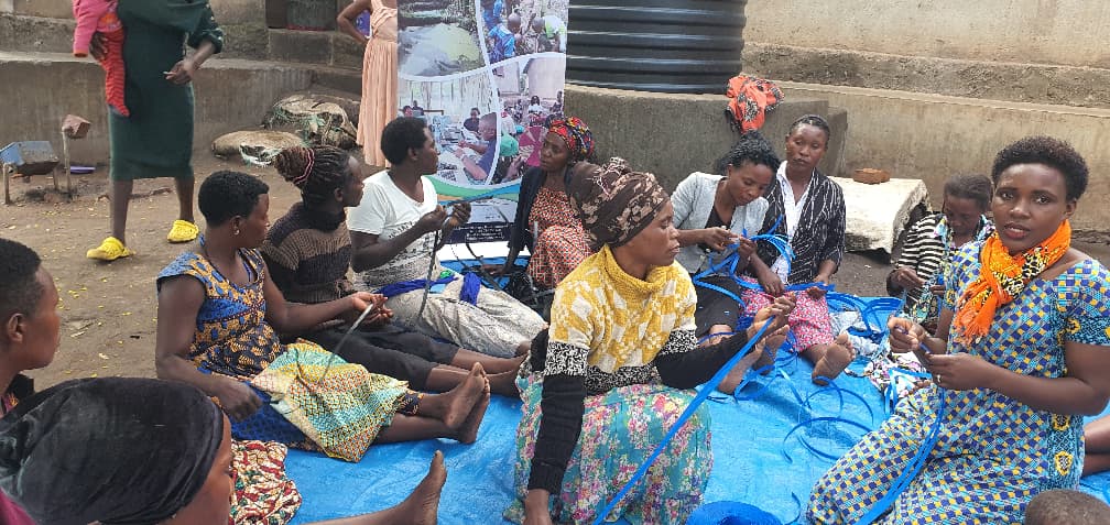 Participants learning practical basket-making skills